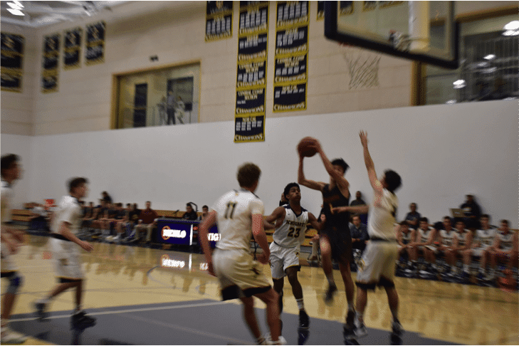 Boys Basketball Defeats Rival Menlo While Playing for a Purpose
