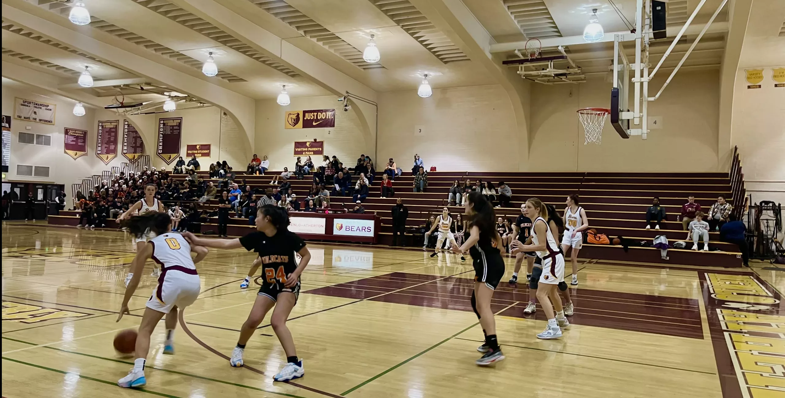 Girls’ and Boys’ Basketball Teams Overpower the Woodside Wildcats on Senior Night